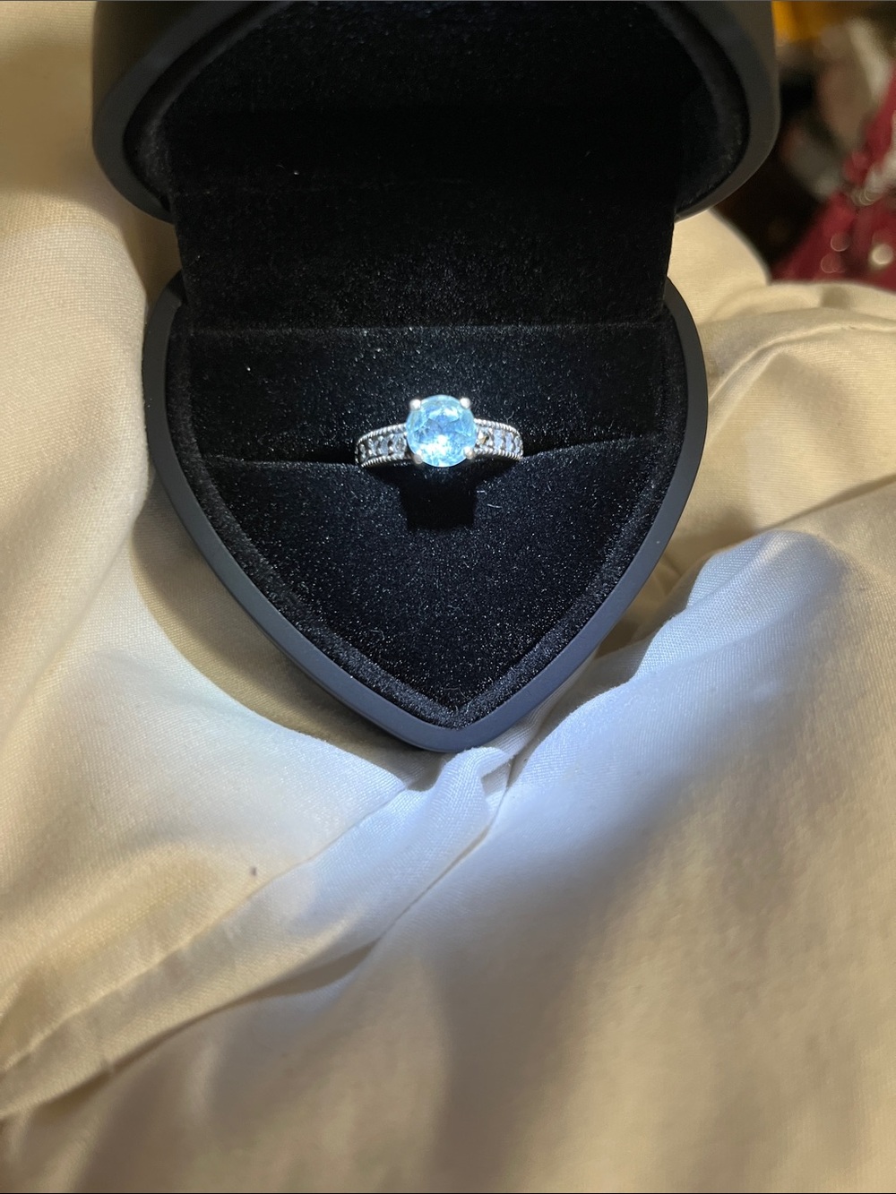 Blue Round Solitaire Ring with Pavé Accent Bands